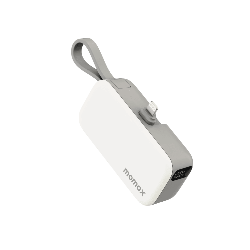 White power bank with gray strap on a green background