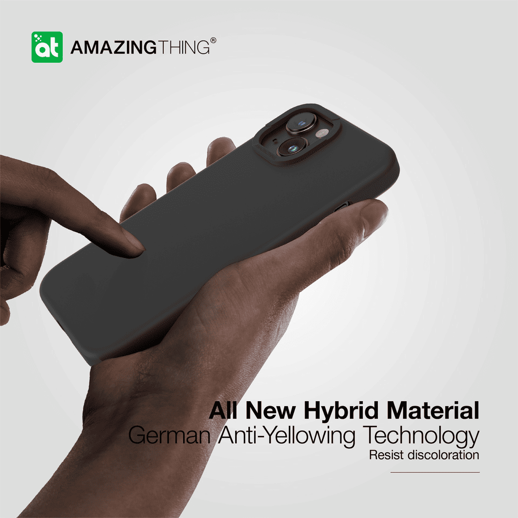 Hand holding a black phone case with 'Amazing Thing' branding and text about hybrid material and anti-yellowing technology.
