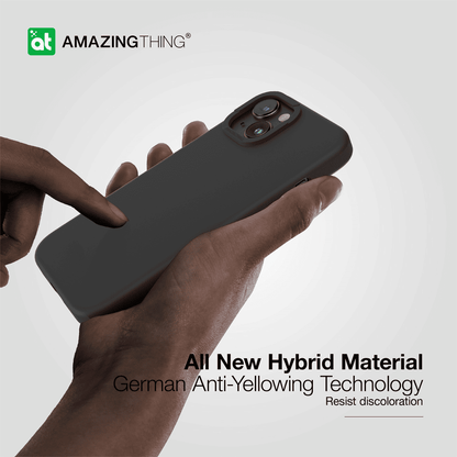 Hand holding a black phone case with 'Amazing Thing' branding and text about hybrid material and anti-yellowing technology.