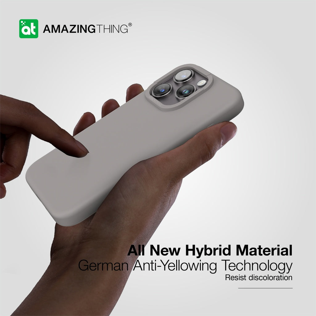 Hand holding grey silicone phone case for iPhone 15 Pro Max with MagSafe compatibility, designed for drop protection.