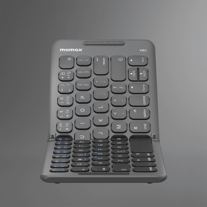 Black keyboard with 'momax' branding on a gray background
