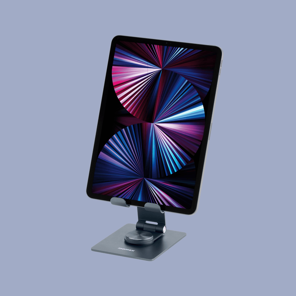 Smartphone on a stand with colorful display against a light blue background