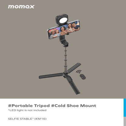Portable tripod with cold shoe mount and smartphone holder on a gray background, featuring the Momax brand.