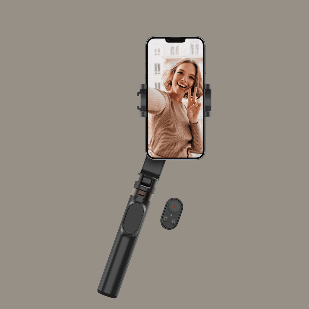 Smartphone with a selfie stick and remote control on a beige background