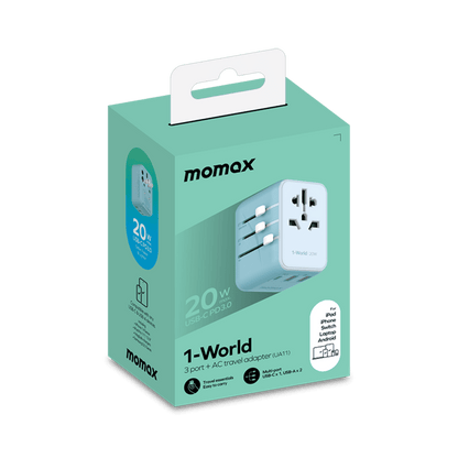Momax travel adapter packaging on a green background
