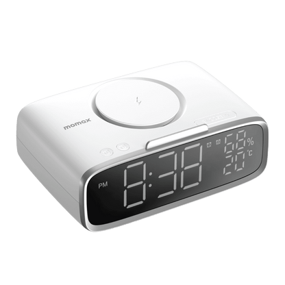 White digital clock with wireless charging pad on a transparent background