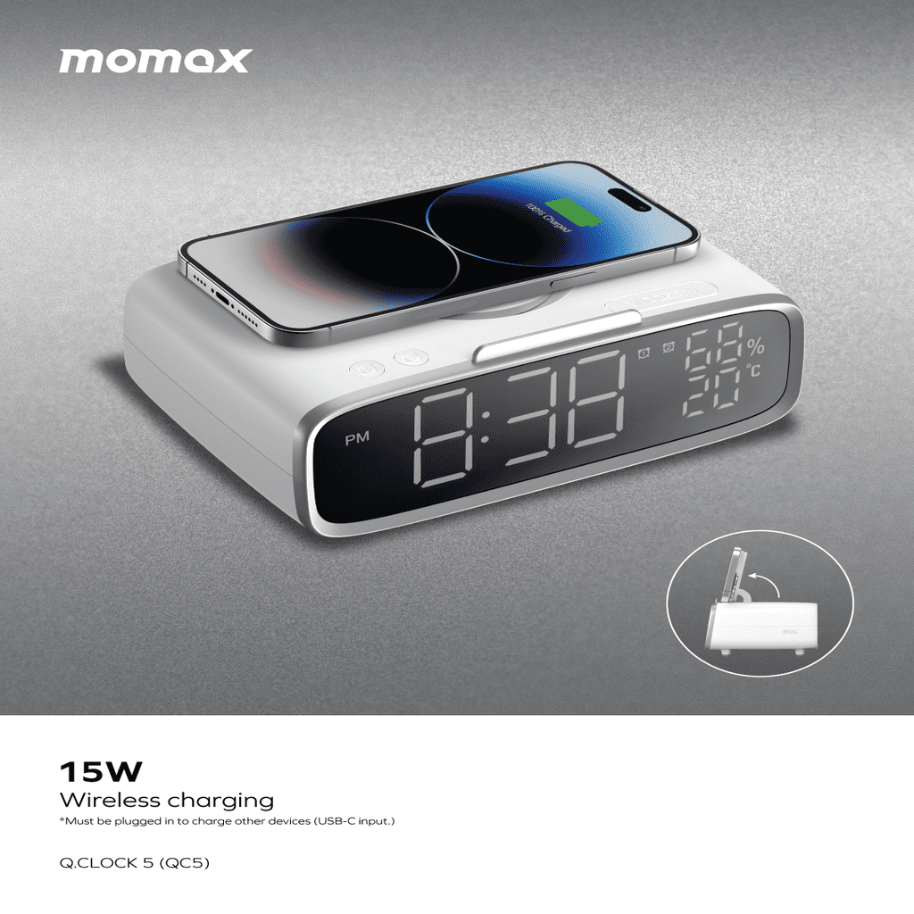 Momax clock with wireless charging pad and smartphone on a gray background