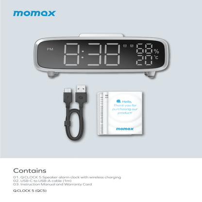 Momax Q.Clock 5 speaker alarm clock with accessories on a light gray background