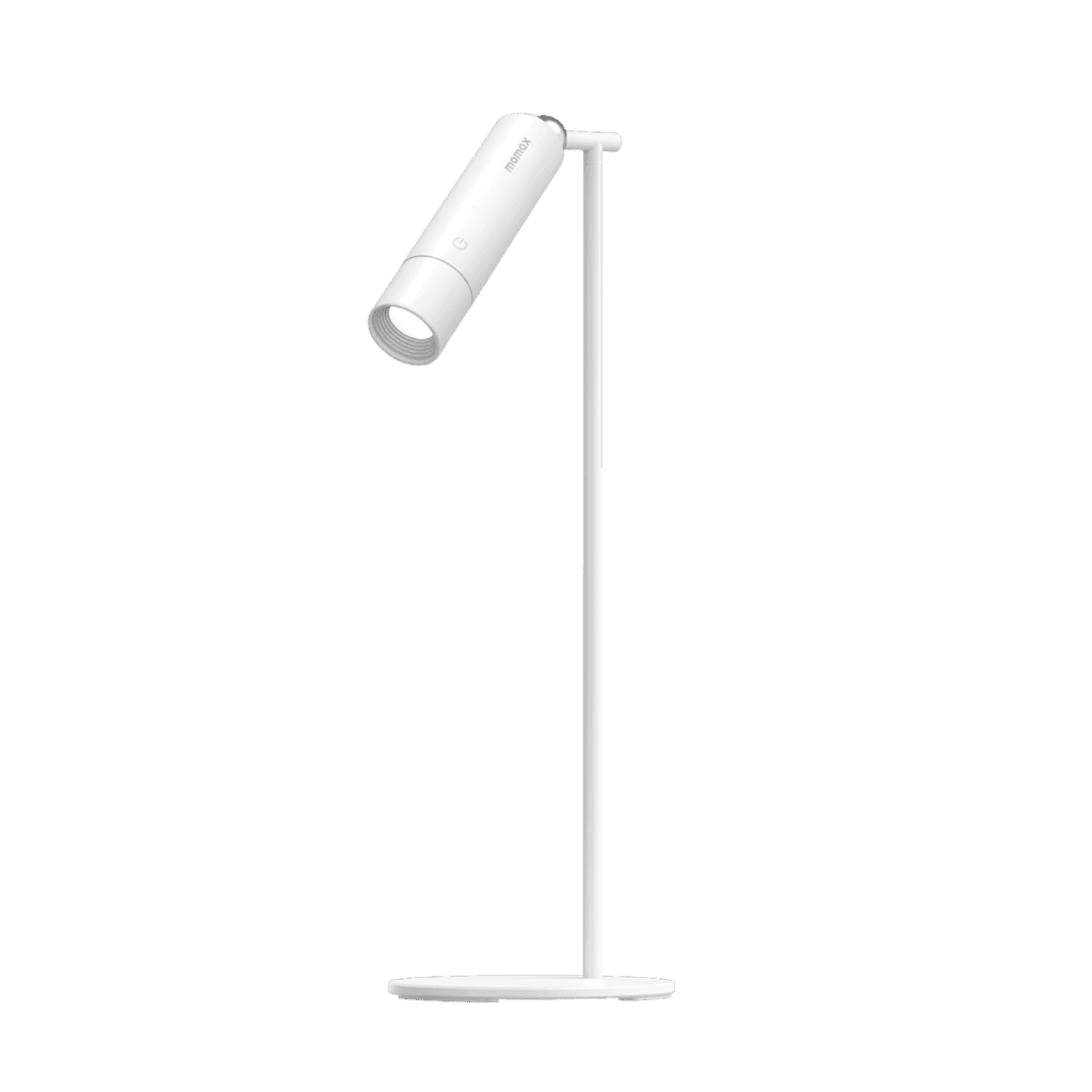 White adjustable desk lamp on a green background
