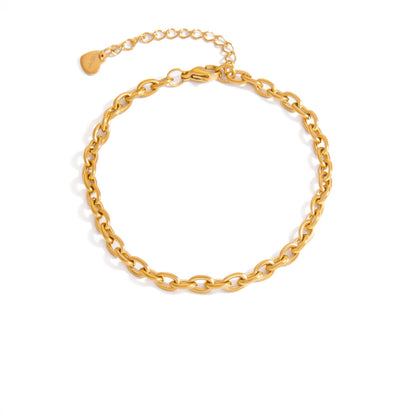 Gold chain bracelet on a white background