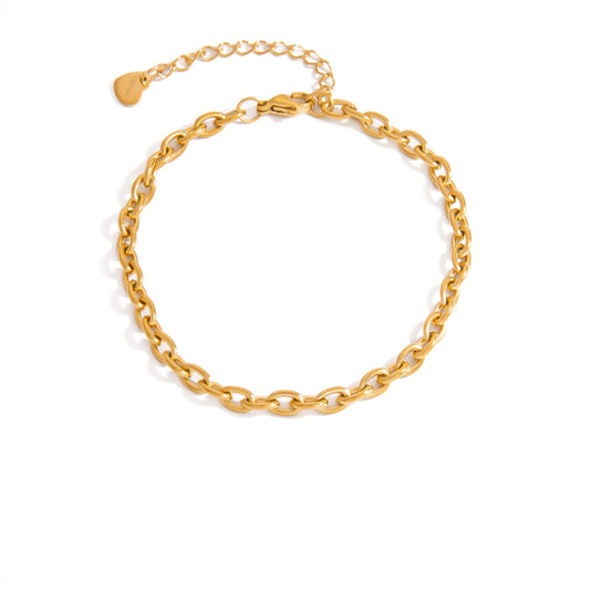 Gold chain bracelet on a white background