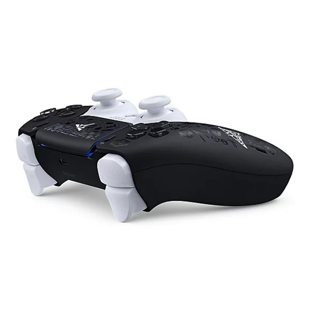 Black and white gaming controller on a white background