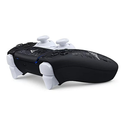 Black and white gaming controller on a white background