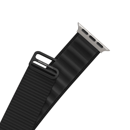 Black watch strap with metal buckle on a white background