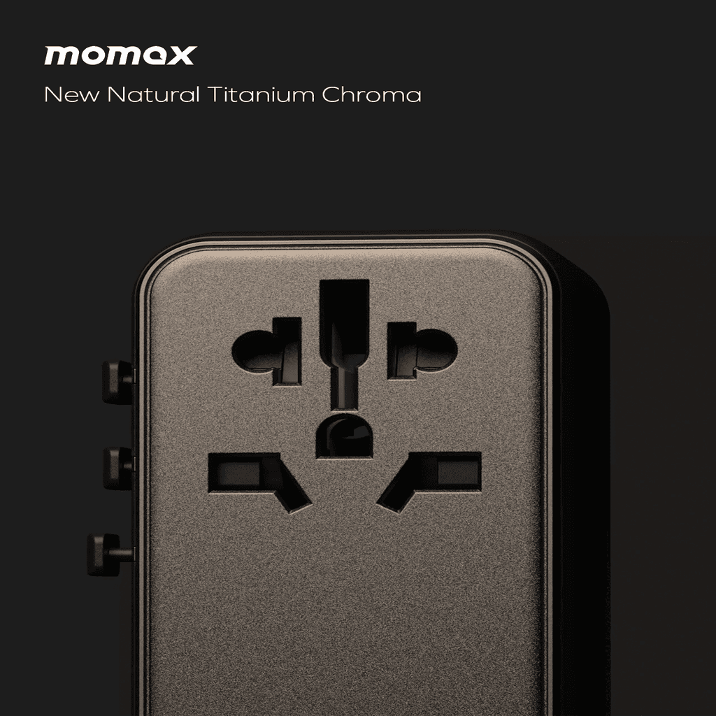 Metallic adapter with 'momax' branding on a dark background