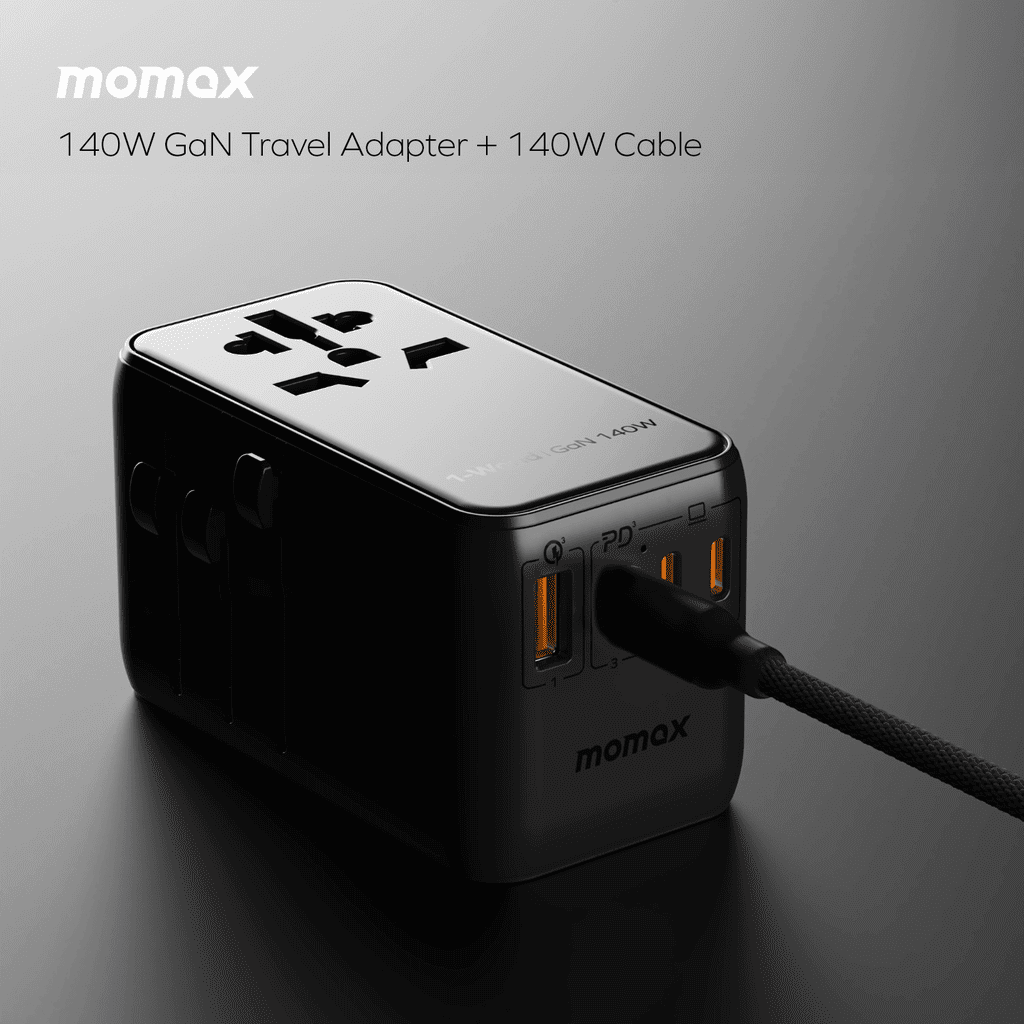 Momax 140W GaN travel adapter with cable on a dark background