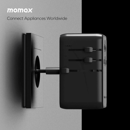 Black power adapter插入wall socket with 'momax' branding