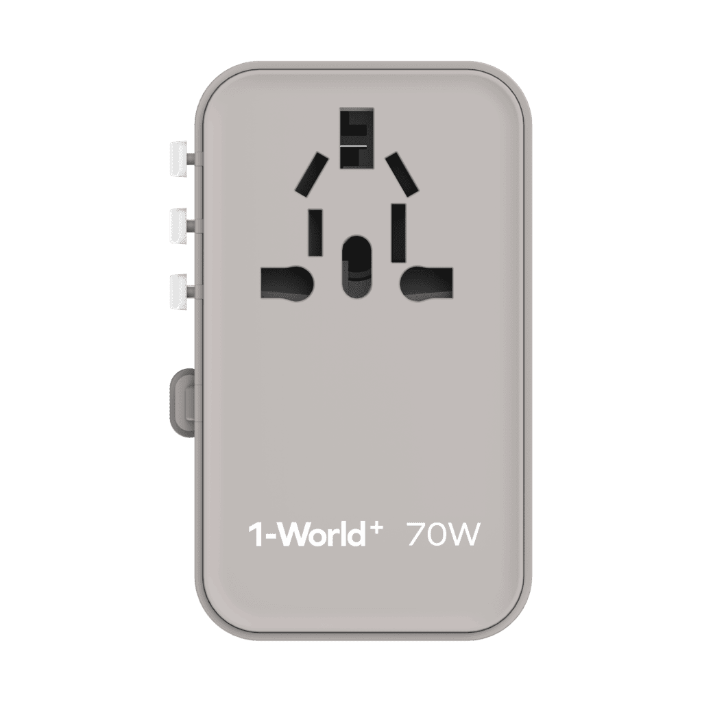 Gray travel adapter with '1-World+' branding on a green background