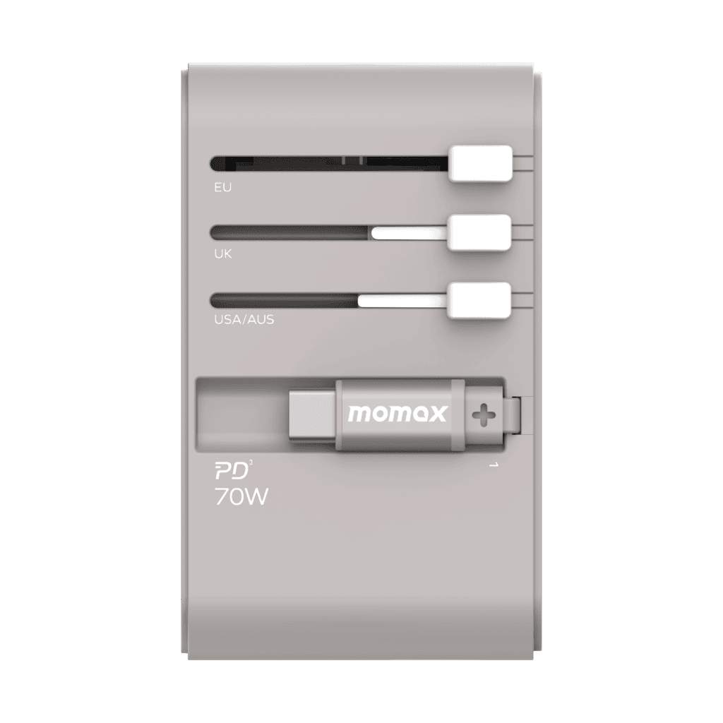 Momax power adapter with multiple plug types on a green background