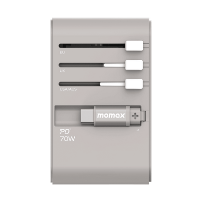 Momax power adapter with multiple plug types on a green background