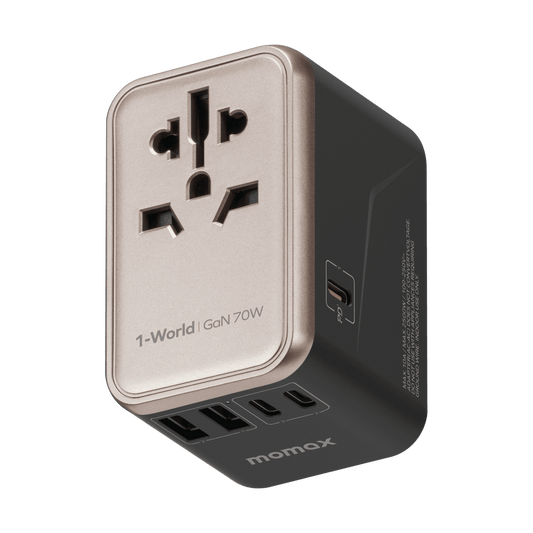 Momax travel adapter with multiple ports on a green background
