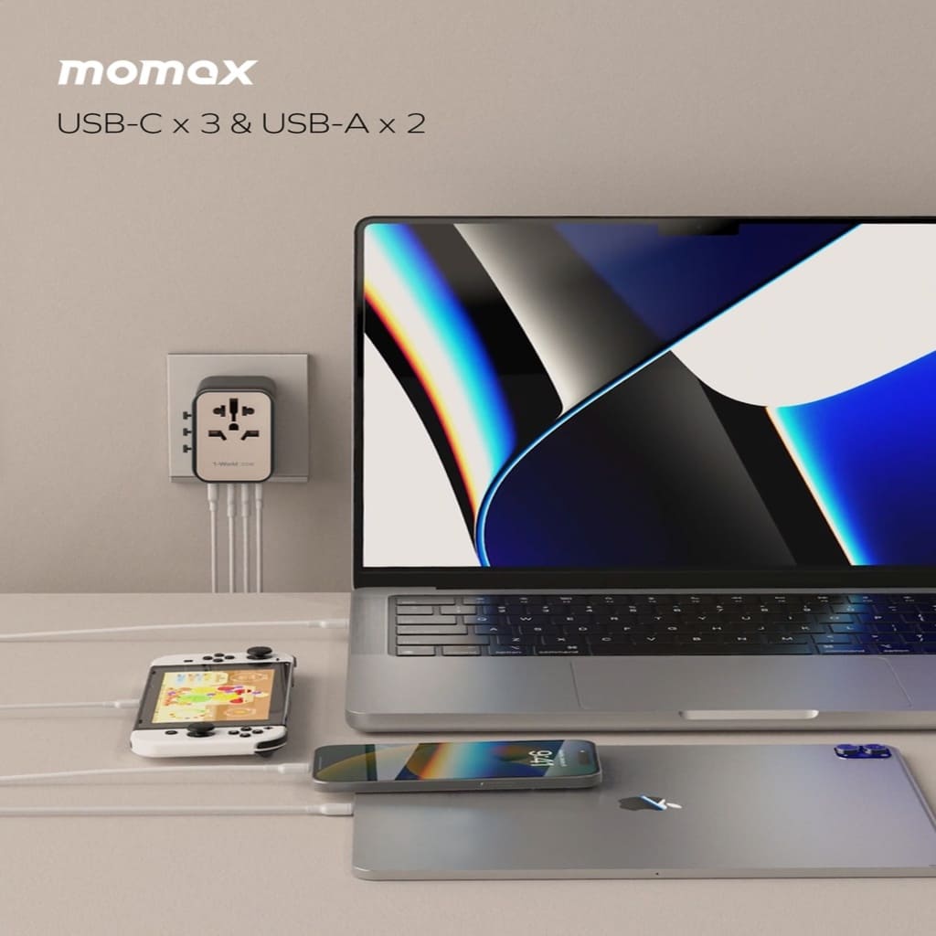 momax USB-C and USB-A adapter with laptop and smartphone on a desk