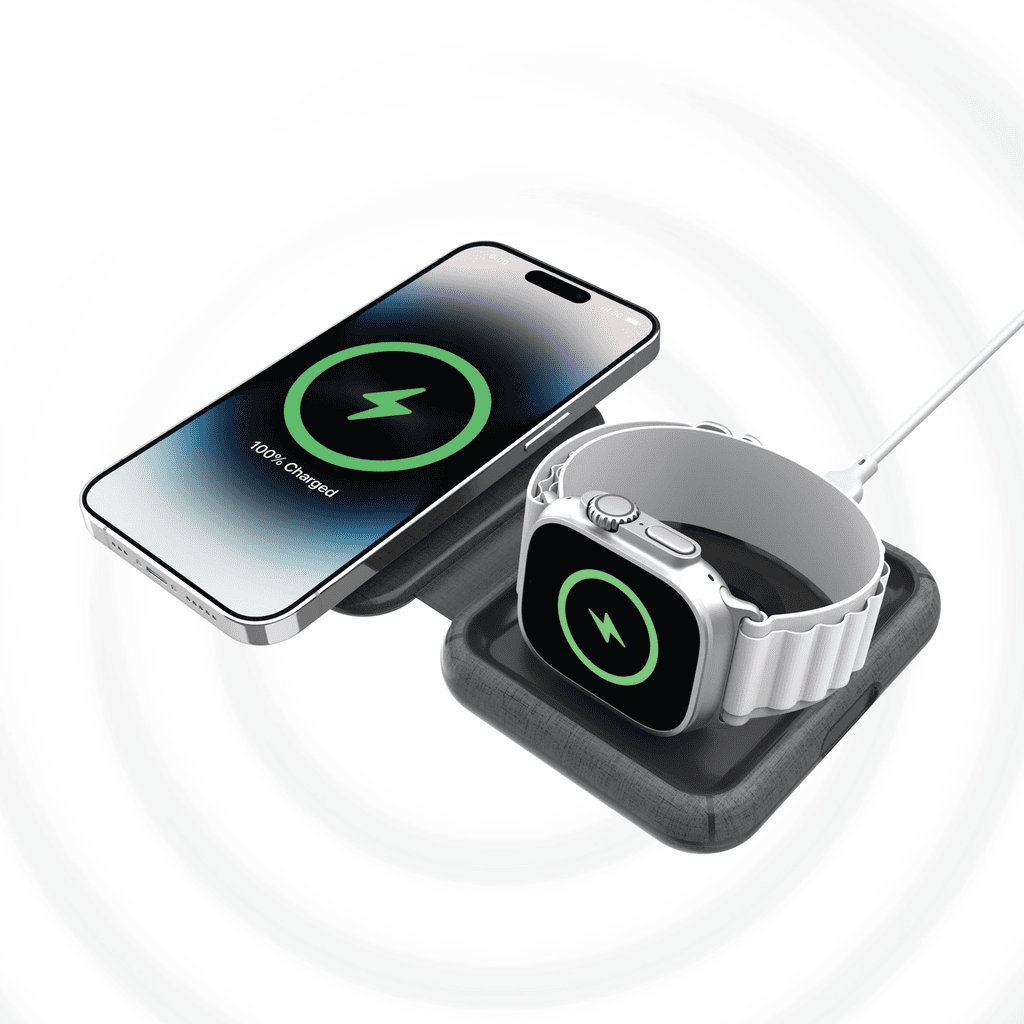 Wireless charging pad with smartphone and smartwatch on a white background