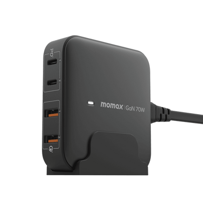 Black power adapter with multiple USB ports and 'momax' branding on a clear background