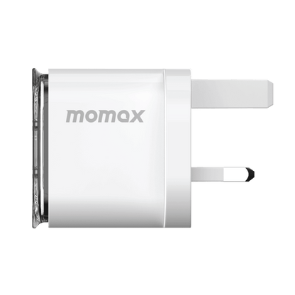 Momax USB charger on a green background
