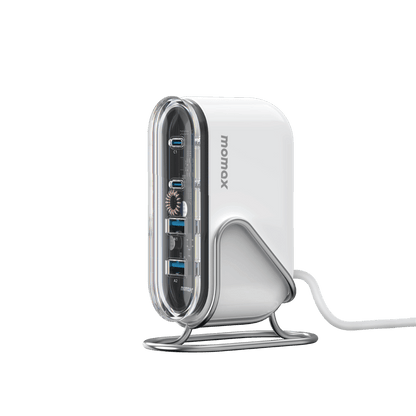 White USB hub with multiple ports on a green background