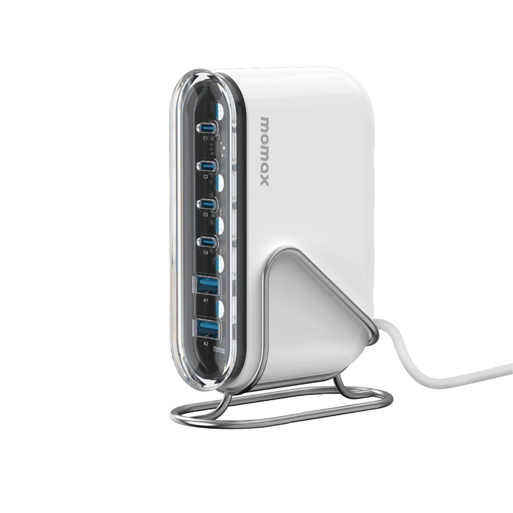 White USB hub with multiple ports on a green background