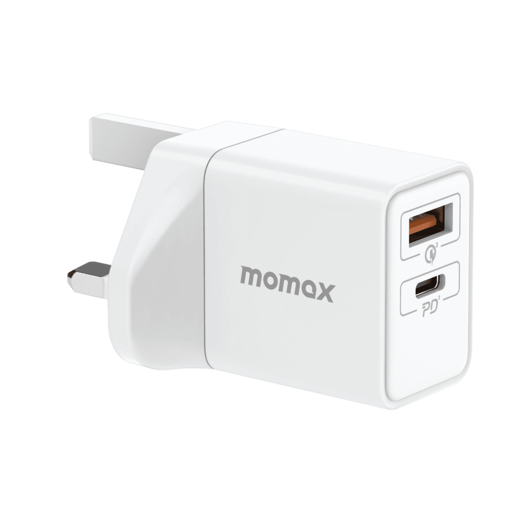 White power adapter with USB-C and USB-A ports on a green background