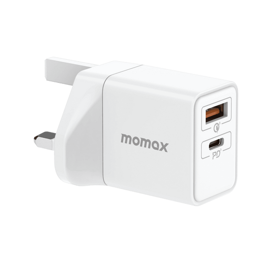 White power adapter with USB-C and USB-A ports on a green background