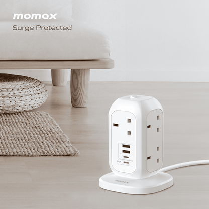 Momax surge protected power strip on a light wooden floor with a neutral background