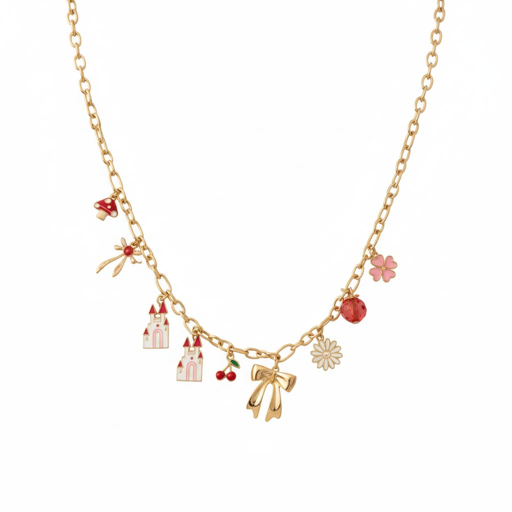 Gold necklace with various charms on a white background