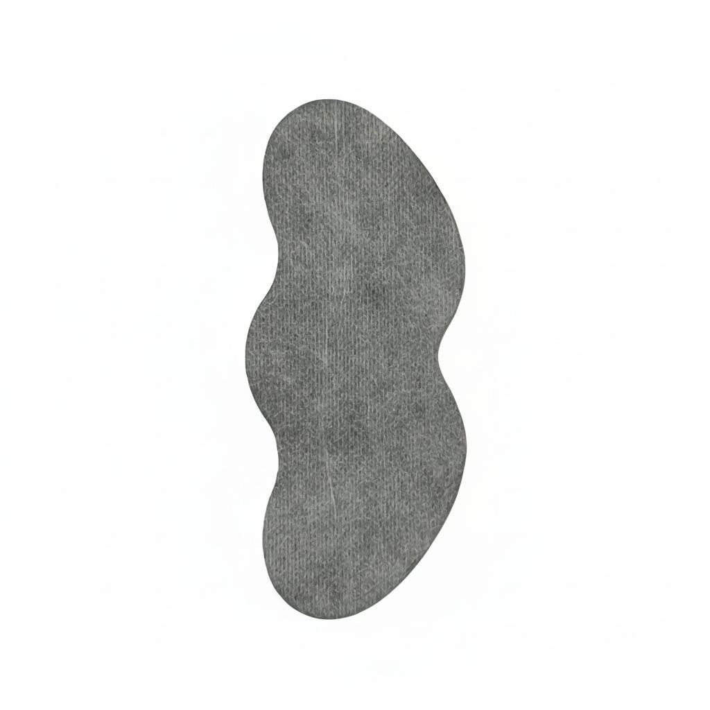 Gray textured rug with a wavy design on a white background