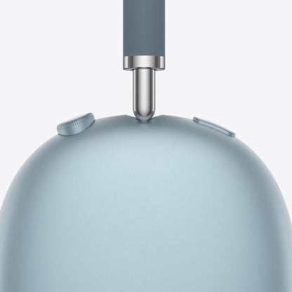 Close-up of a light blue kitchen mixer with a gray handle on a white background