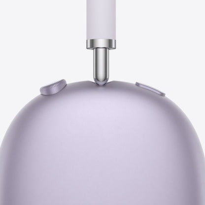 Close-up of a purple electronic device with a white cylindrical component on a light gray background