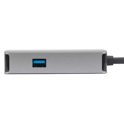 Silver USB hub with blue LED indicator on a white background