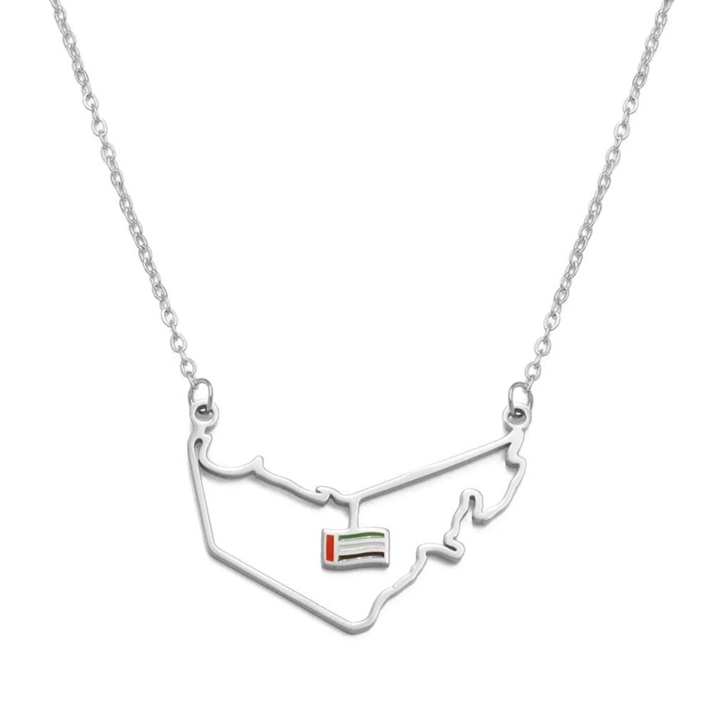 Silver necklace with a map design on a white background